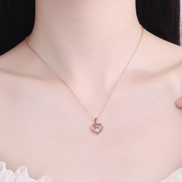 Heart - Shaped Silver Necklace with Blue Gem - Image 4
